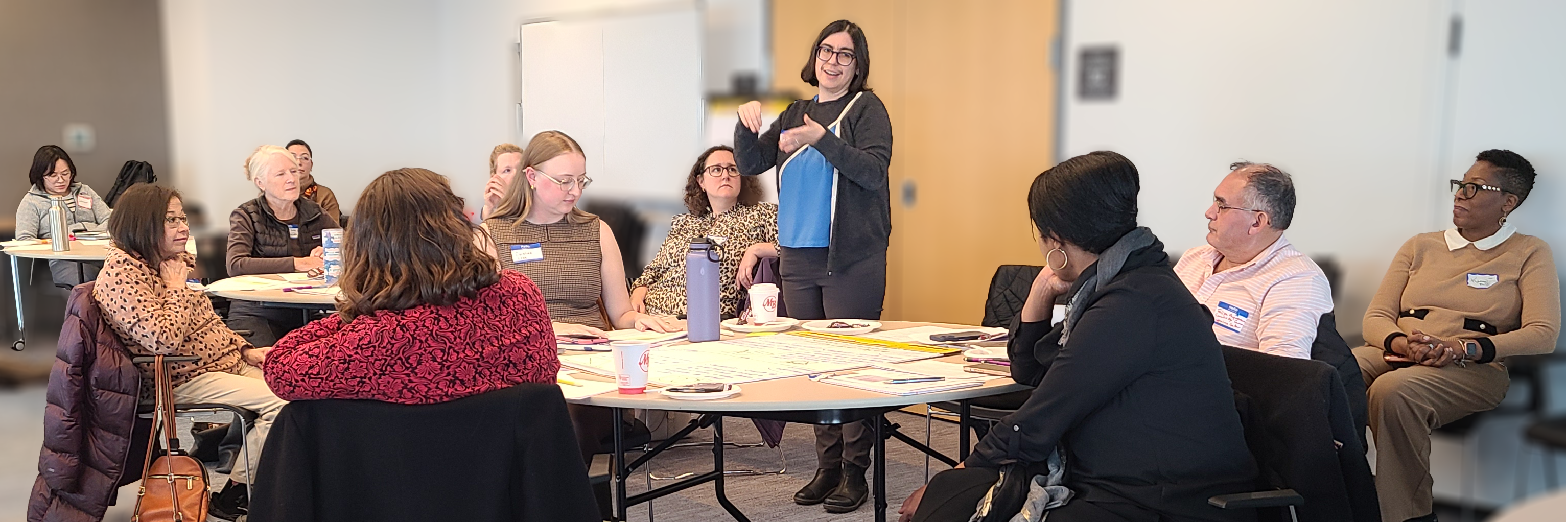 Participants listening to Pesha Black