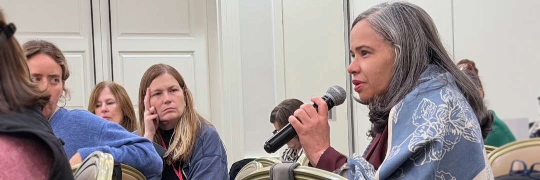 Woman speaking at the Directors Meeting 2026 Program-Wide Workforce Preparation session
