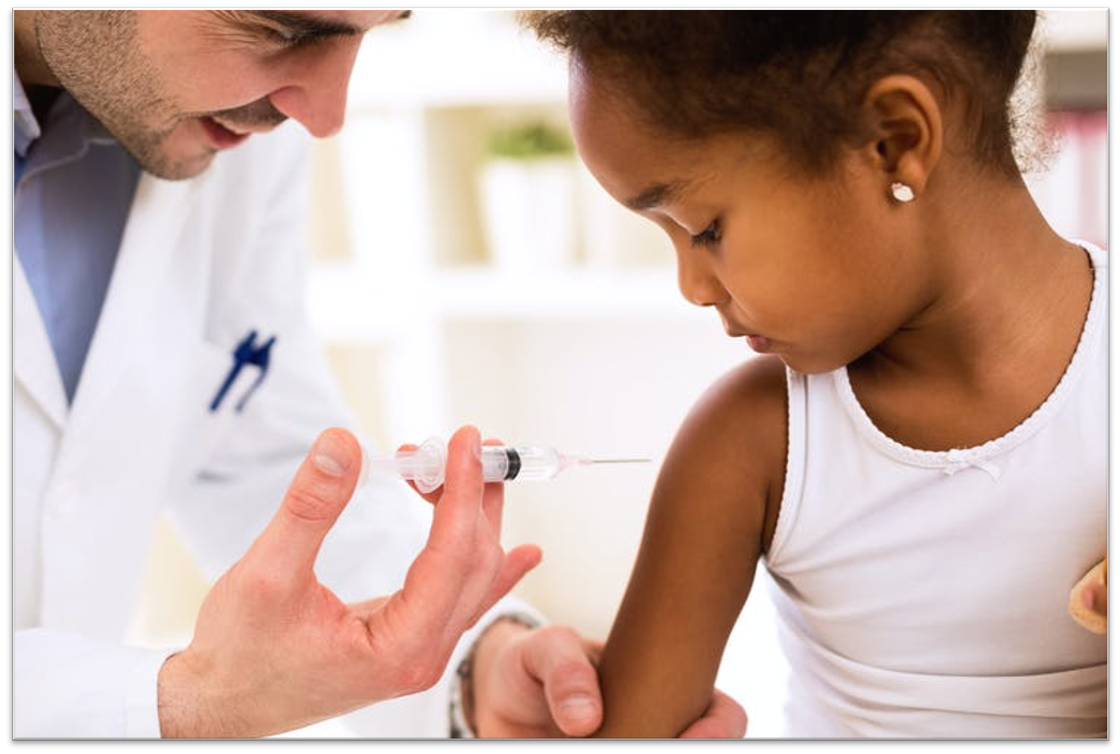 little girl receiving vaccine
