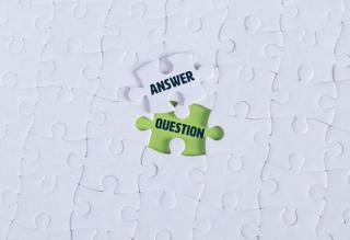 jigsaw puzzle with 'question' and 'answer' pieces