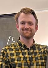 Jon smiling red hair and red beard