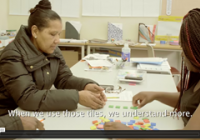 Two women working on math manipulatives